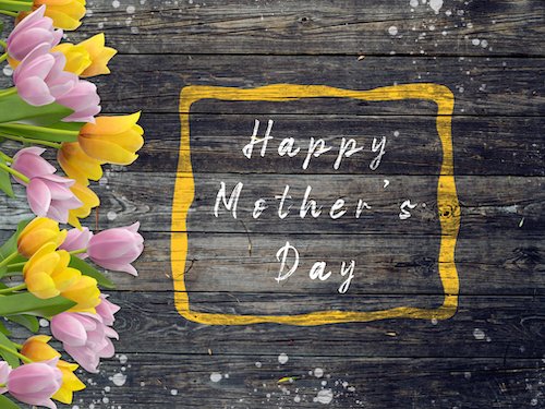 Mother's day on wooden background