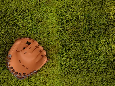 Baseball glove on grass