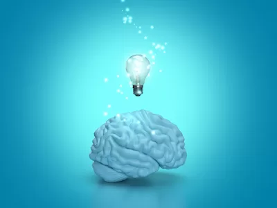Human brain with light bulb