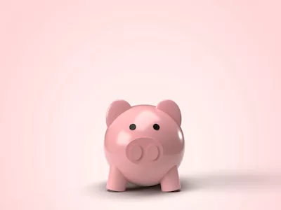 3D pink piggy bank on pink background.