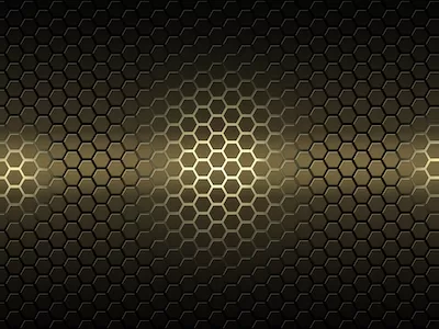 Gold hexagonal honeycomb metal on black background.