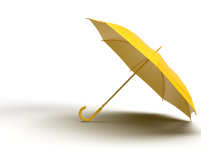 Yellow open tilted umbrella on w