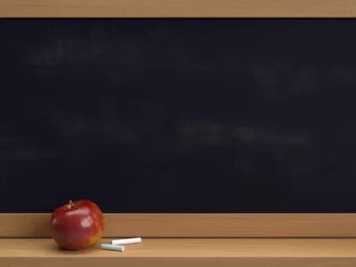 3D Black board with red apple and chalks