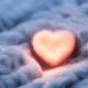 Wool heart with light - Wool heart with yellow light stock photo