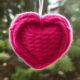 Pink wool knitted heart - Pink wool knitted heart stock photo