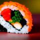 Sushi roll with salmon closeup - Sushi roll with salmon closeup stock image.